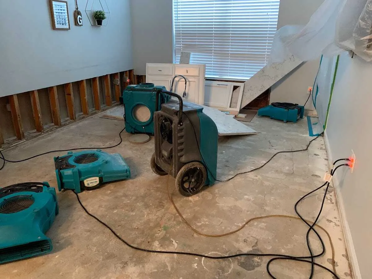 Dehumidifier in flood-cut room for Water Damage Restoration in Sterling